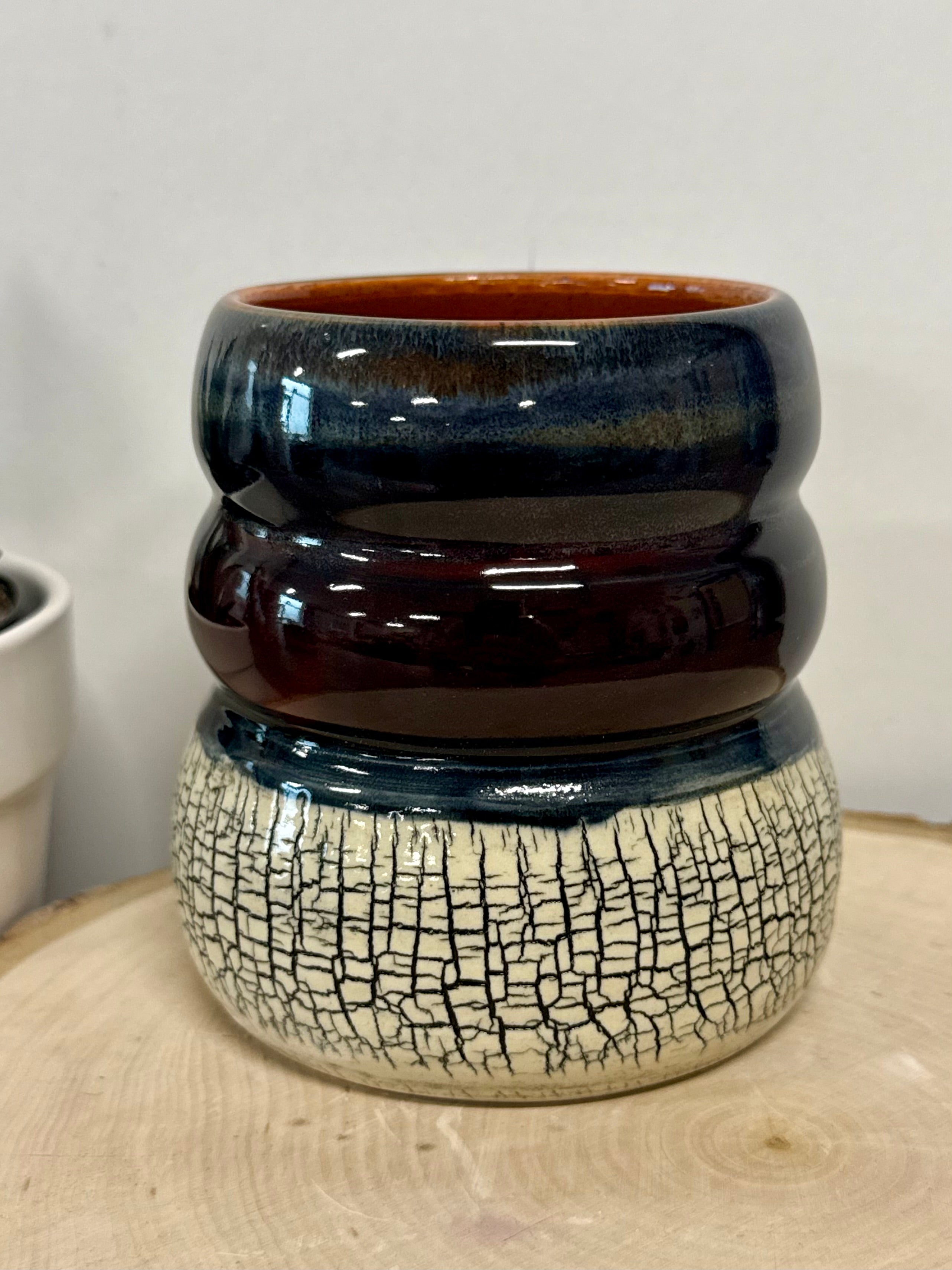 Black, blue, and orange crackle bubble mug