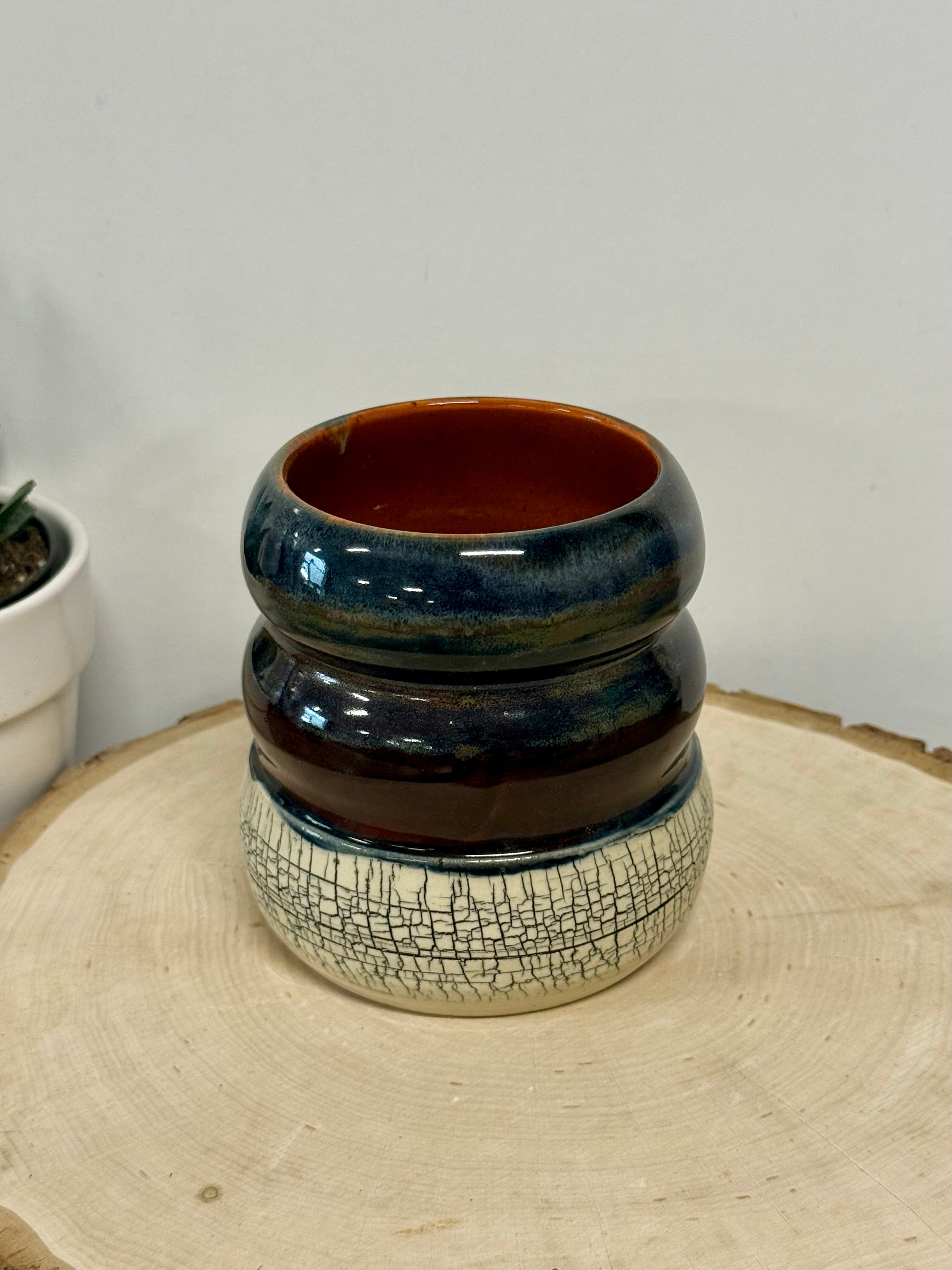 Black, blue, and orange crackle bubble mug