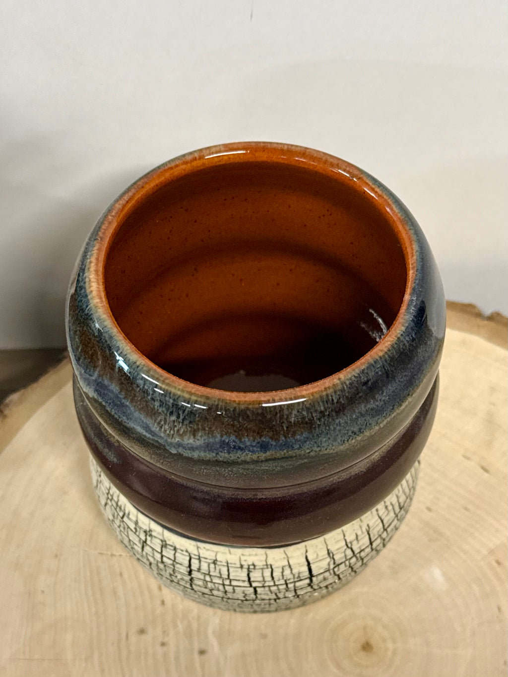 Black, blue, and orange crackle bubble mug