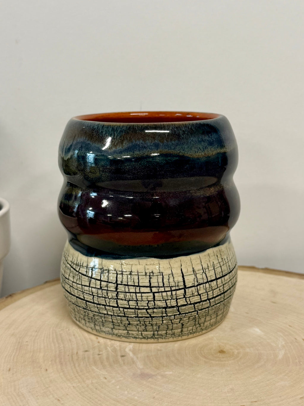 Black, blue, and orange crackle bubble mug