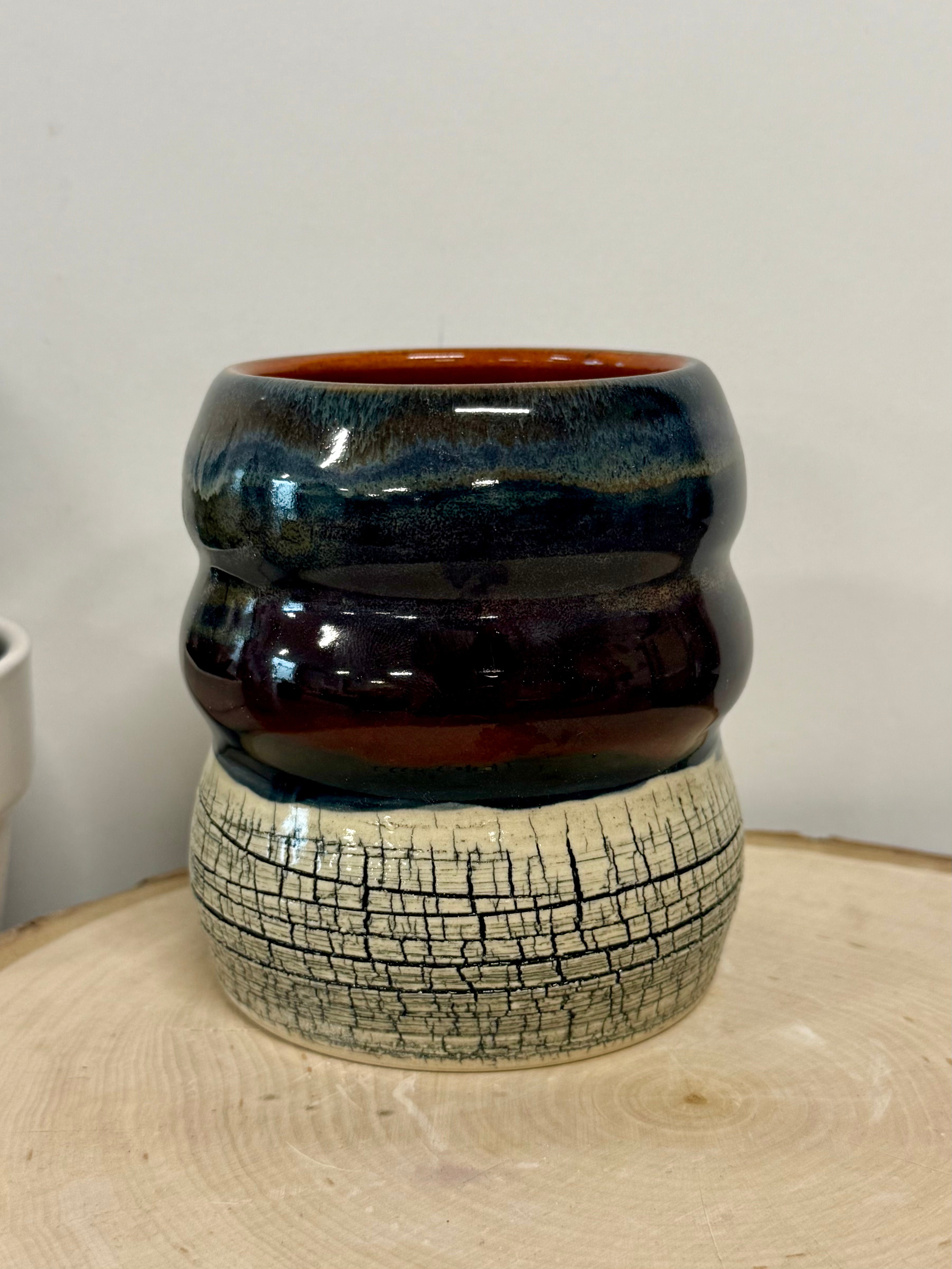 Black, blue, and orange crackle bubble mug