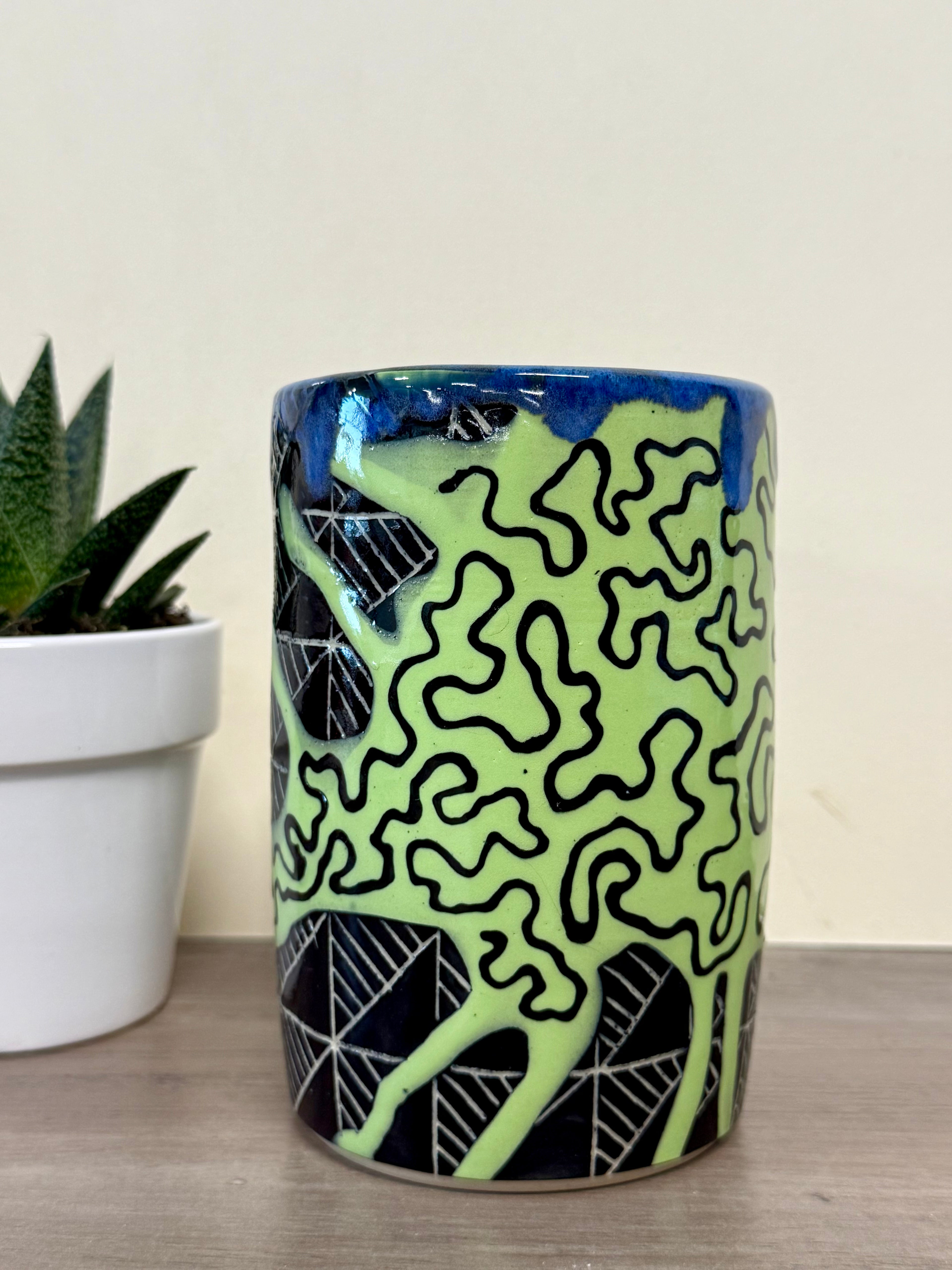 Thrown cylinder with underglaze designs