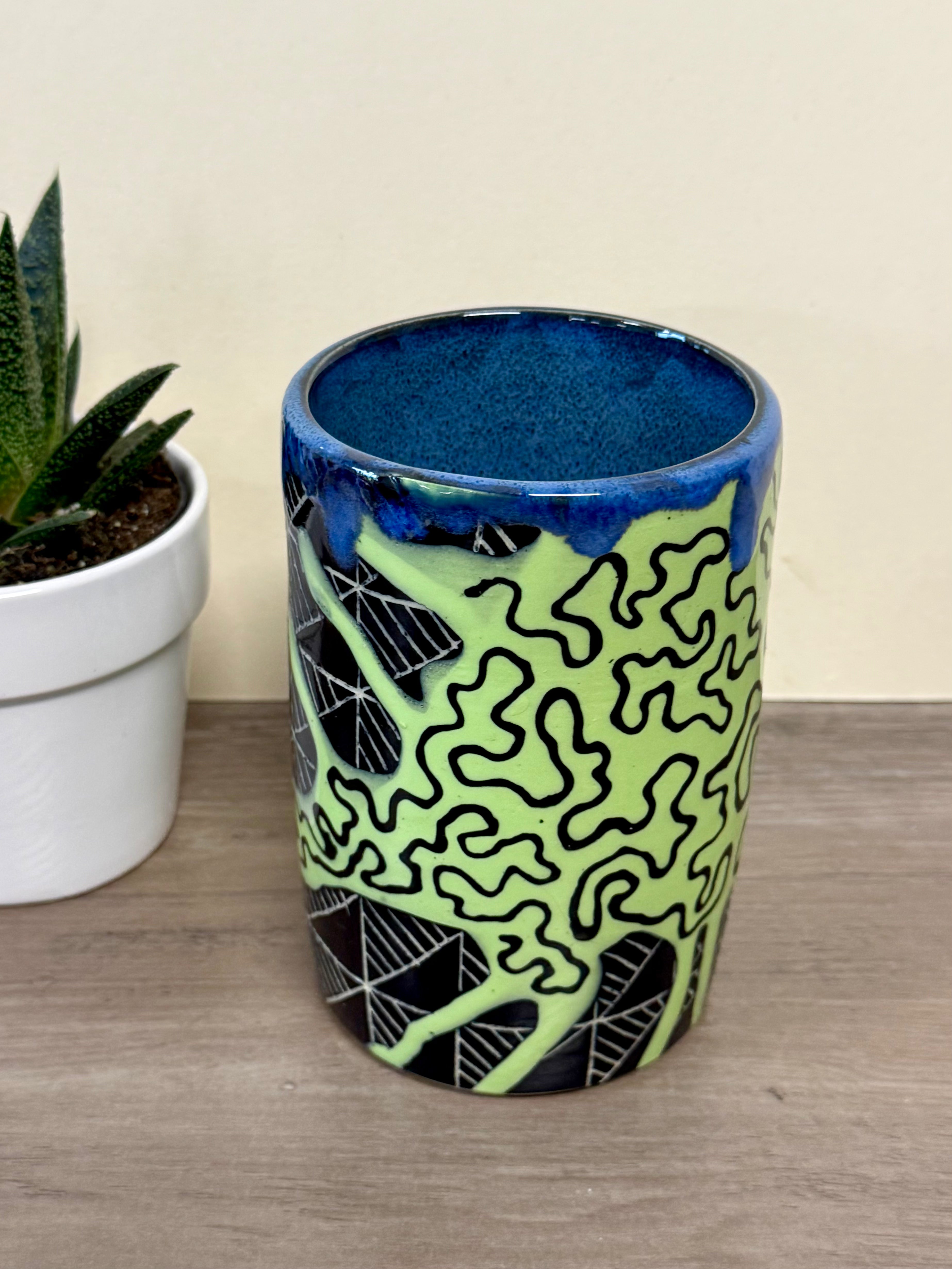 Thrown cylinder with underglaze designs