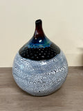 Round Vase with long neck, speckled glaze