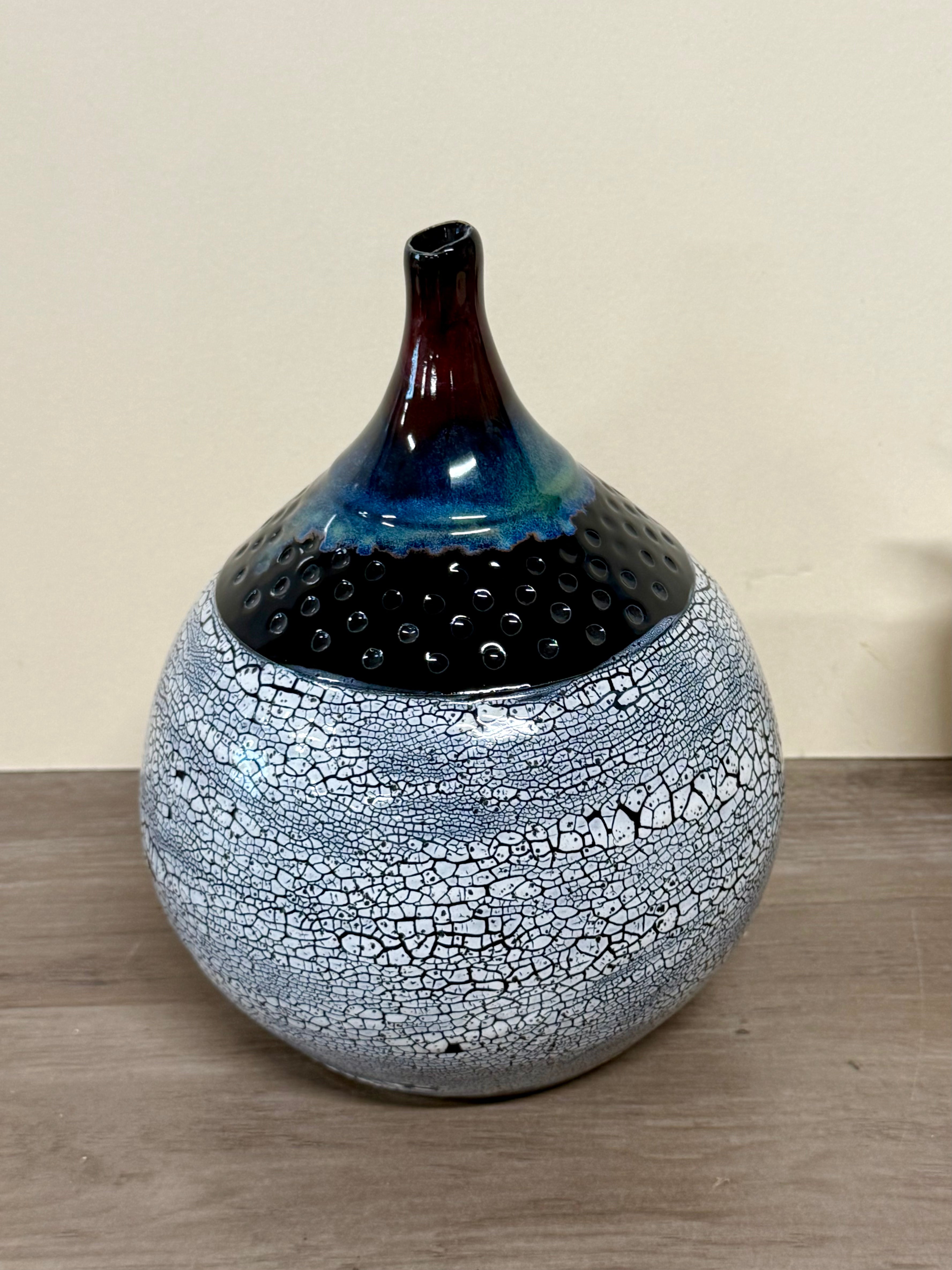 Round Vase with long neck, speckled glaze