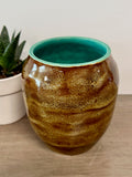 Thrown vase with speckled brown glaze