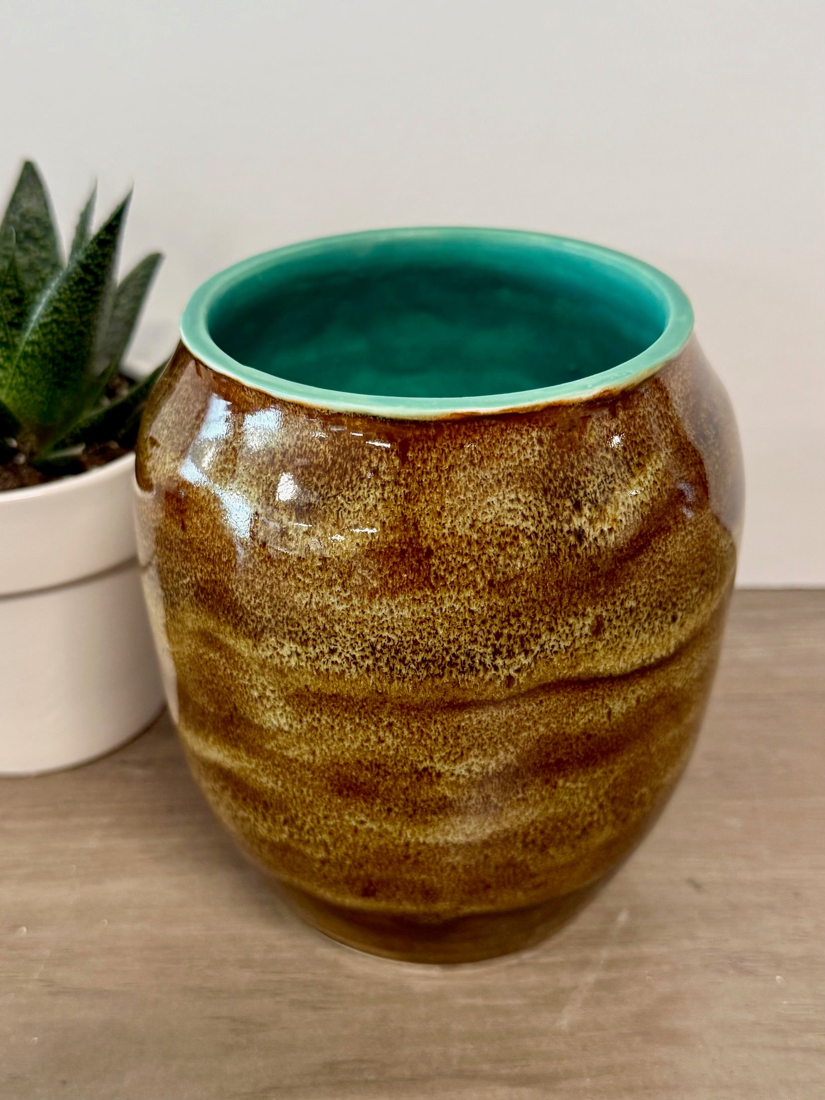 Thrown vase with speckled brown glaze